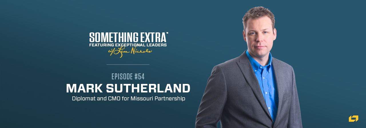 "Something Extra episode 54" blue podcast banner with an image of a man, Mark Sutherland